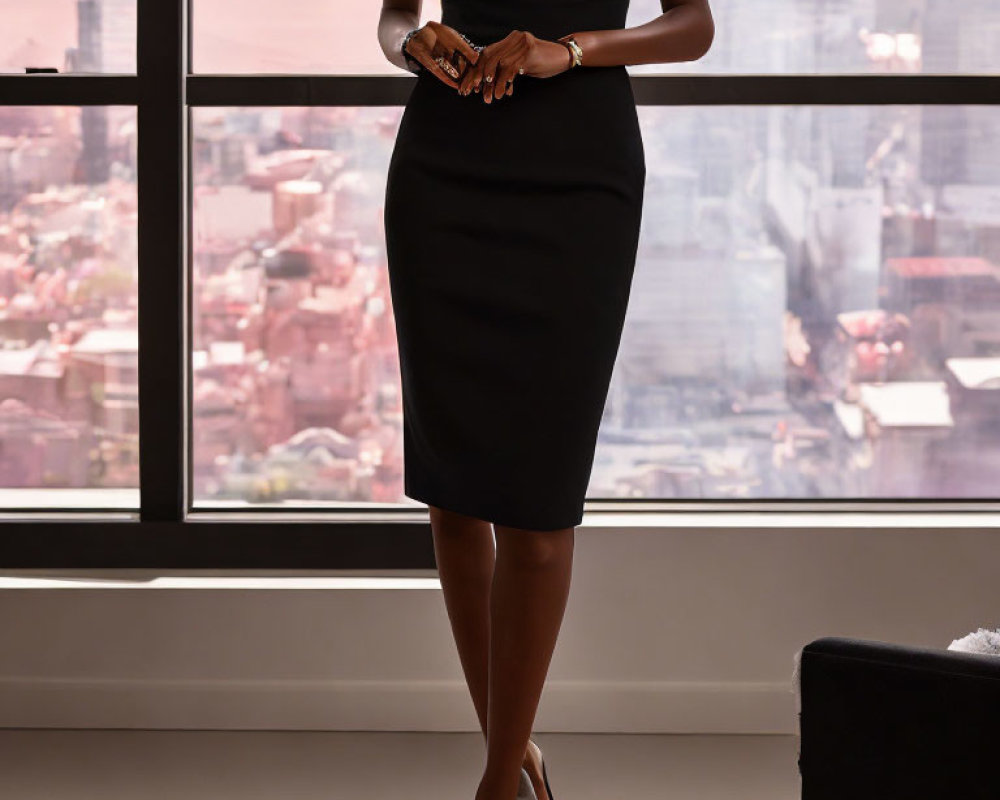 Woman in black dress with smartphone by cityscape window