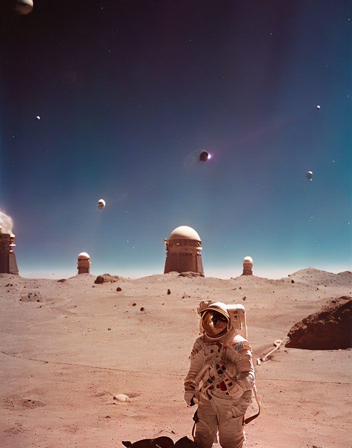 Astronaut on rocky surface with distant structures and celestial bodies.