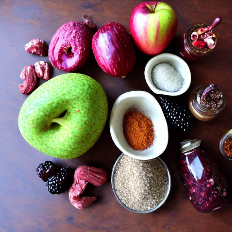 Assorted Fruits, Spices, and Nuts on Wooden Surface