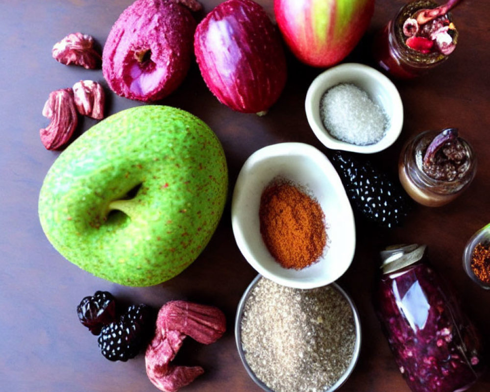 Assorted Fruits, Spices, and Nuts on Wooden Surface