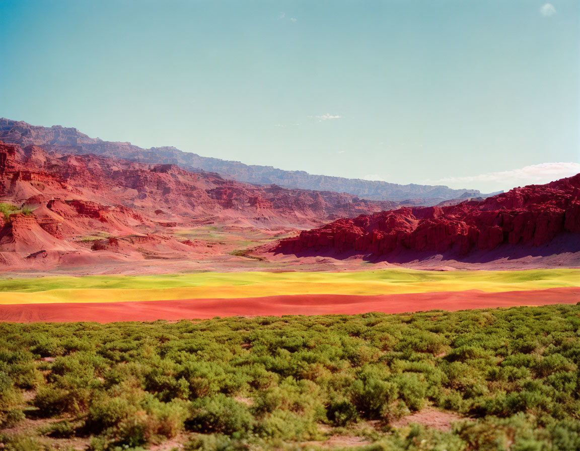 Colorful Red Rock Formations and Lush Greenery in Vibrant Landscape