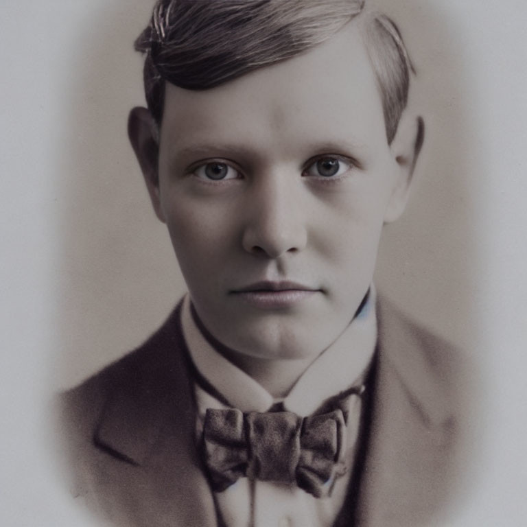 Sepia-Toned Vintage Portrait of Young Man with Bow Tie