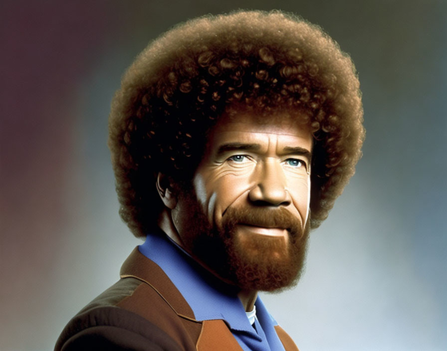 Portrait of person with afro, beard, brown jacket, blue shirt, and gradient background.