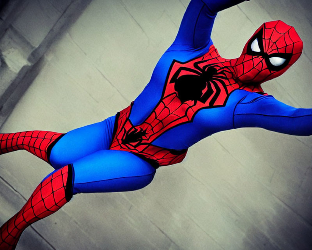 Person in Spider-Man costume striking dynamic swinging pose