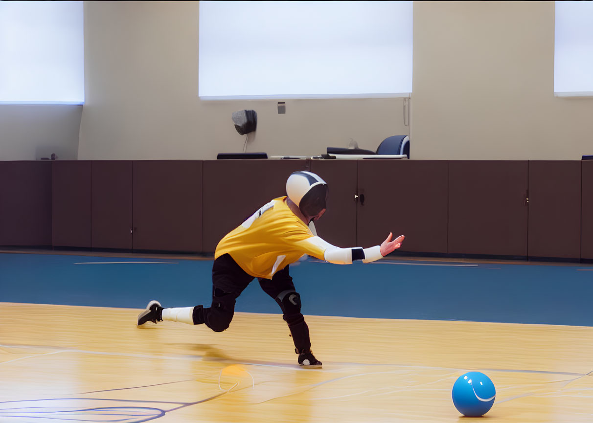 Player in protective gear playing goalball indoors