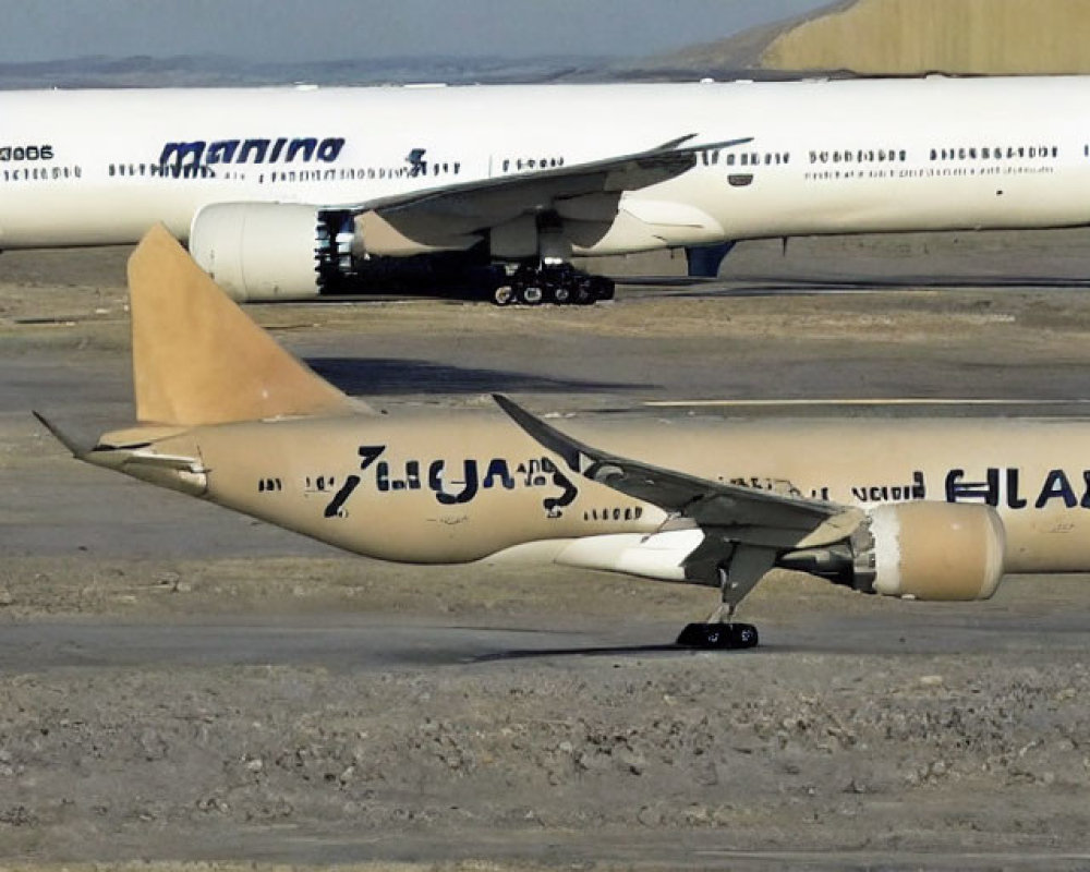 Split Fuselage and Tail Section of Damaged Airplane on Deserted Airstrip