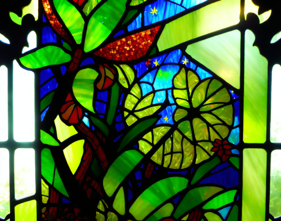 Colorful stained glass window with green foliage, red flowers, and blue starry background