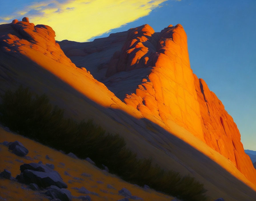 Scenic mountain landscape at sunset with warm sunlight on rocky peaks