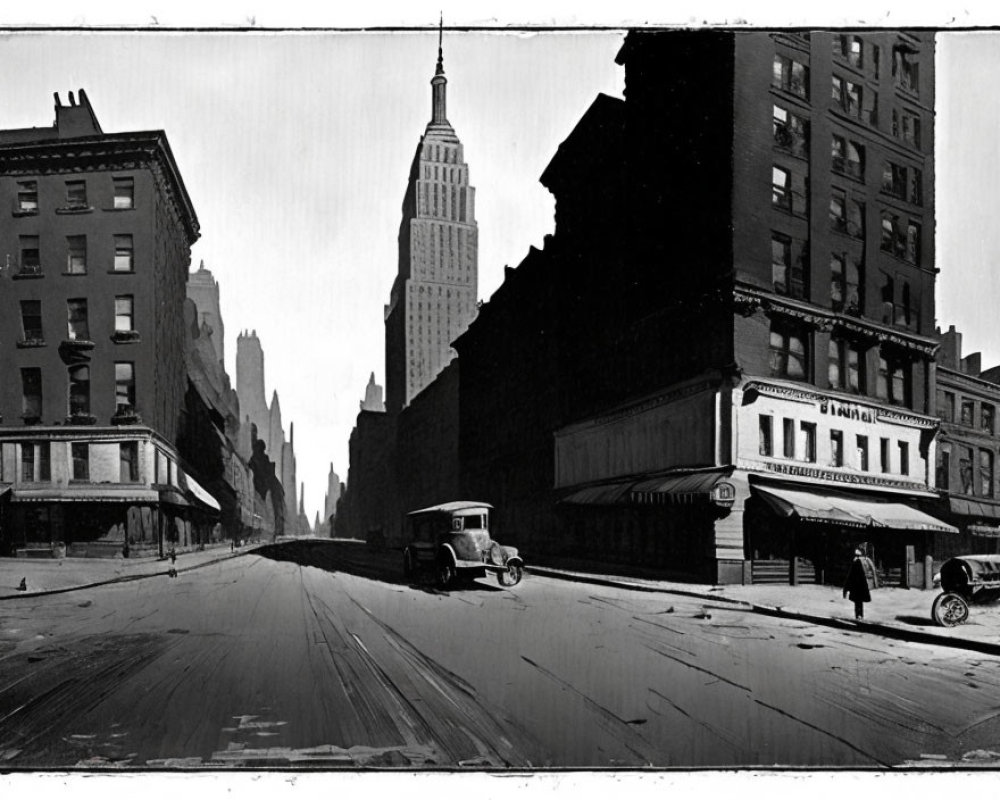 Vintage cars and Empire State Building in black and white city street photo.