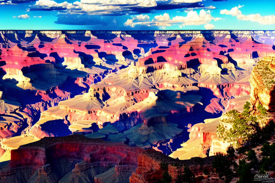 Layered Red Rock Formations in Grand Canyon under Blue Sky