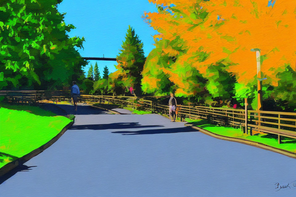 Two people walking on path with green and yellow trees and wooden fence