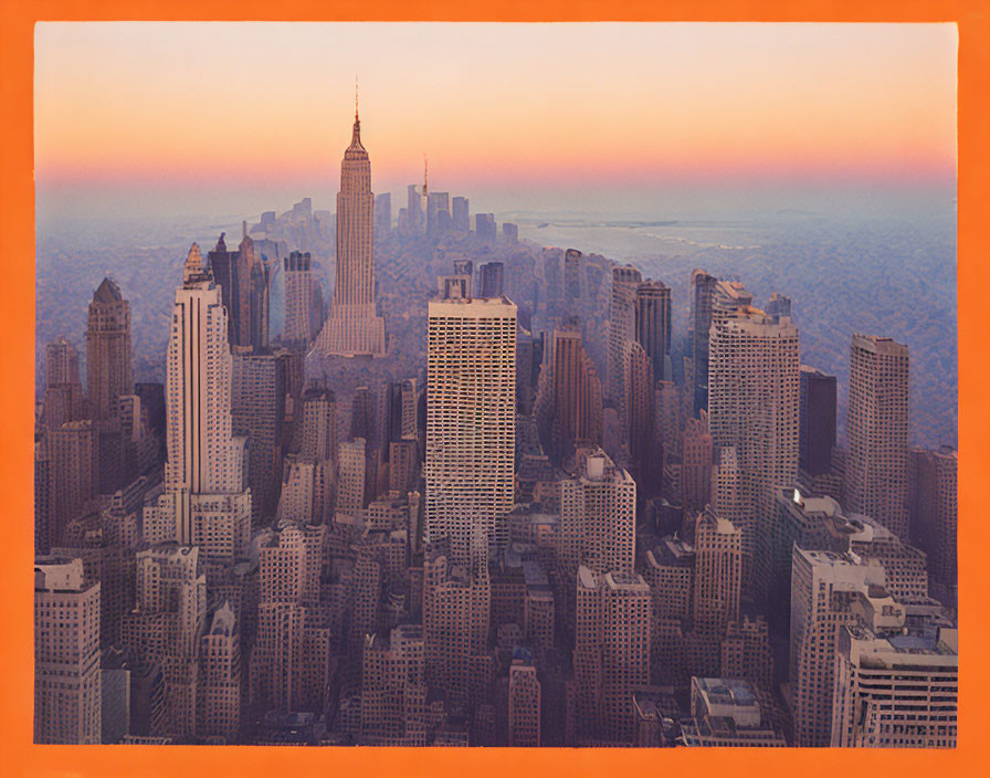 City skyline at sunset with tall buildings and skyscrapers in warm orange glow