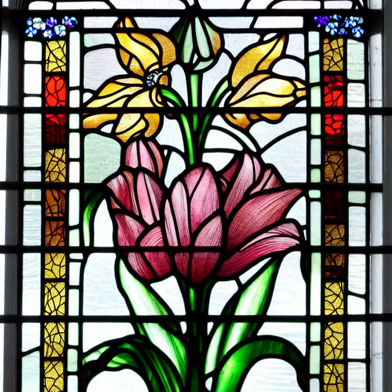 Vibrant stained glass window with pink flower and yellow blooms