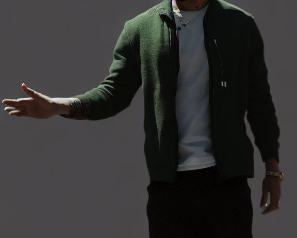 Man in Green Jacket and Black Pants with Beard and Mustache Gesturing