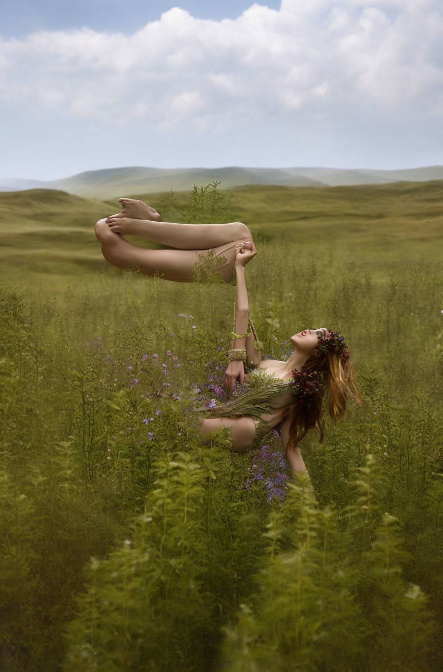 Woman with flower crown dances in meadow under cloudy sky