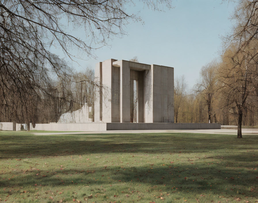 Minimalist Concrete Monument in Tranquil Park with Bare Trees