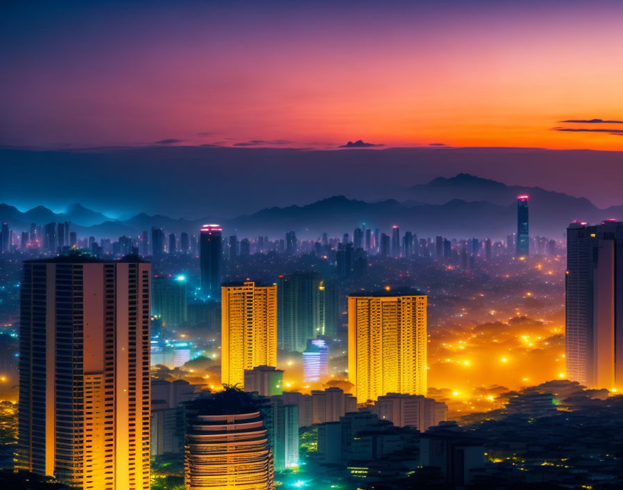 Urban skyline with illuminated skyscrapers at twilight in vibrant purple and orange sky