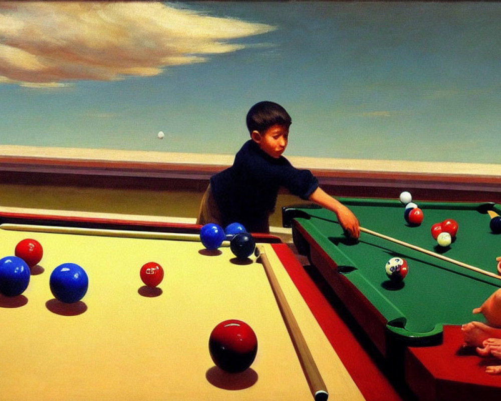 Young boy playing billiards on a green felt pool table