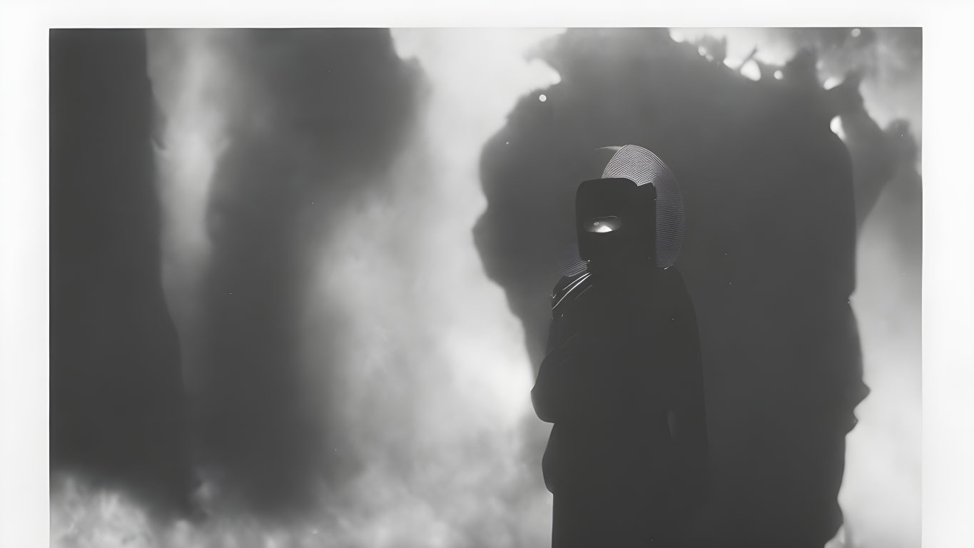 Mysterious silhouette in mask and robe with dramatic lighting