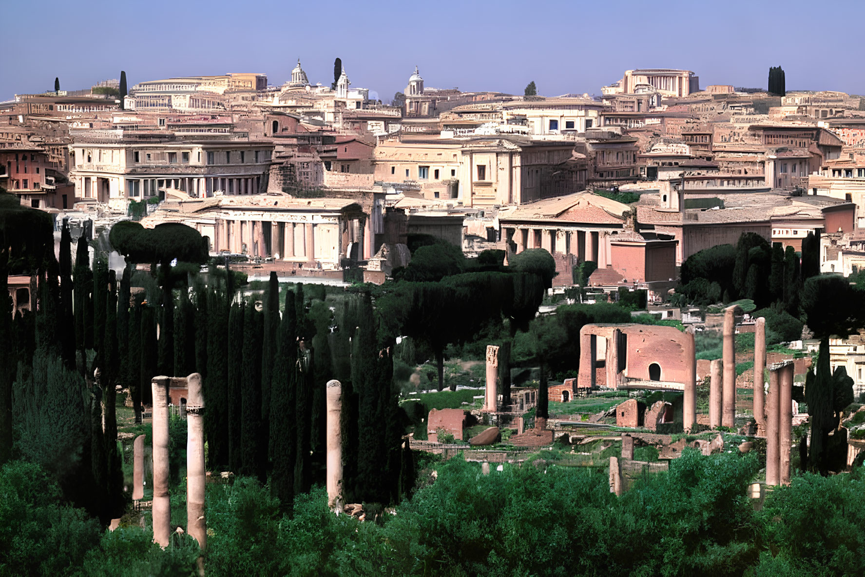 Roman Forum ruins with scattered ancient columns against Rome's cityscape