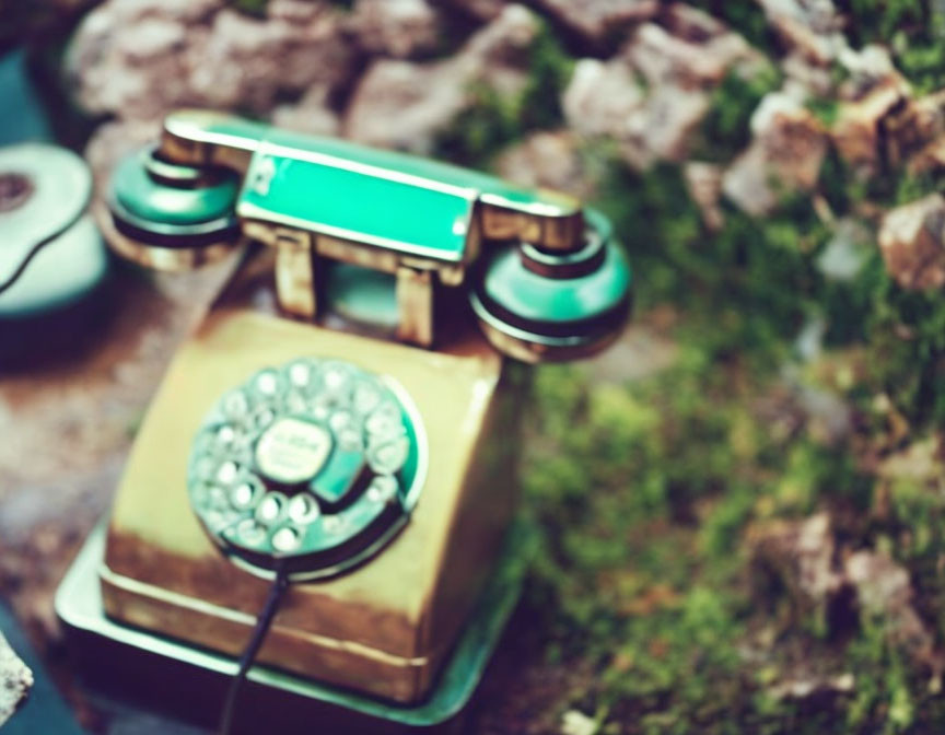 Vintage Rotary Telephone with Blurred Background