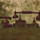 Assorted vintage telephones on table with varied designs