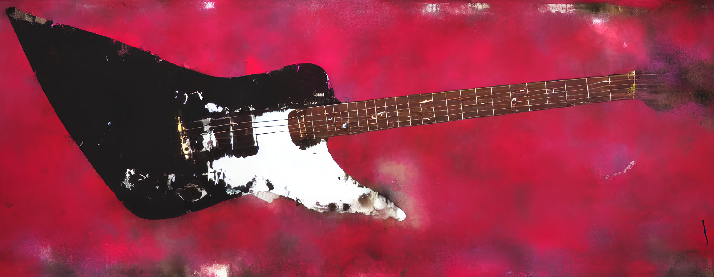 Vintage black and white electric guitar on crimson textured background