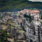 Serene monastery on rocky cliffs in illustrated landscape