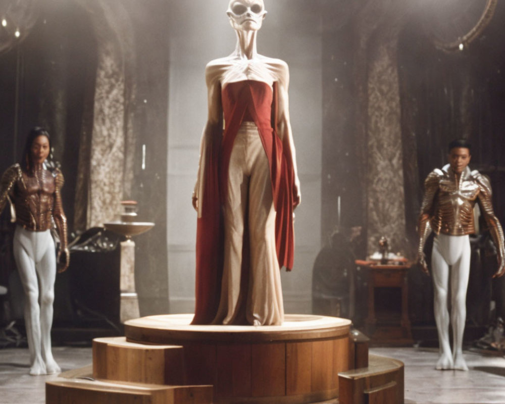 Skeletal humanoid figure in gown on circular stage with futuristic armor individuals