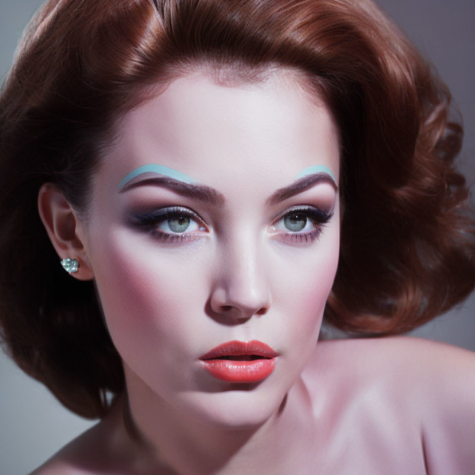 Woman with Blue Eyeshadow and Red Lips in Dramatic Makeup Portrait