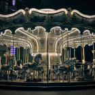 Ornate Mythical Creature Carousel at Night with Decorative Lights