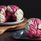 Detailed Fondant Human Brain Dessert Presentation with Pink Accents