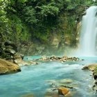 Tranquil Tropical Waterfall in Lush Greenery