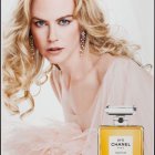 Elegant perfume ad: Woman with blue eyes and blonde hair.