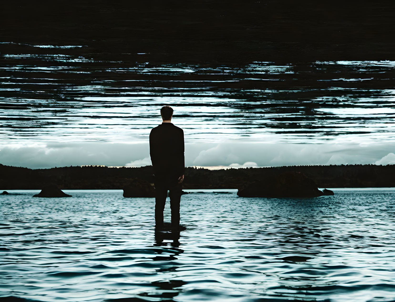 Solitary Figure by Tranquil Lake with Cloudy Sky Reflections