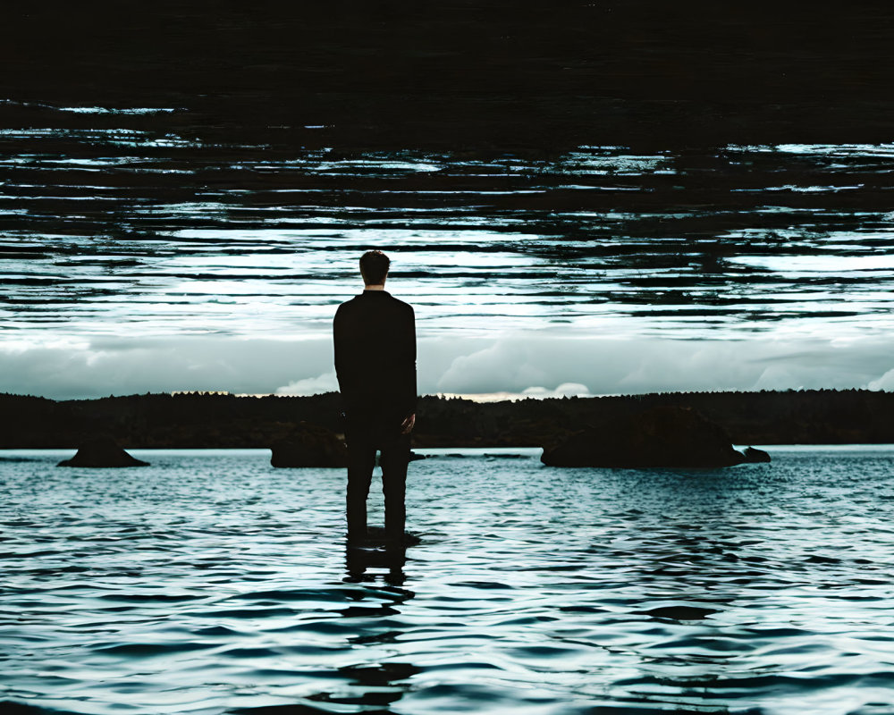 Solitary Figure by Tranquil Lake with Cloudy Sky Reflections