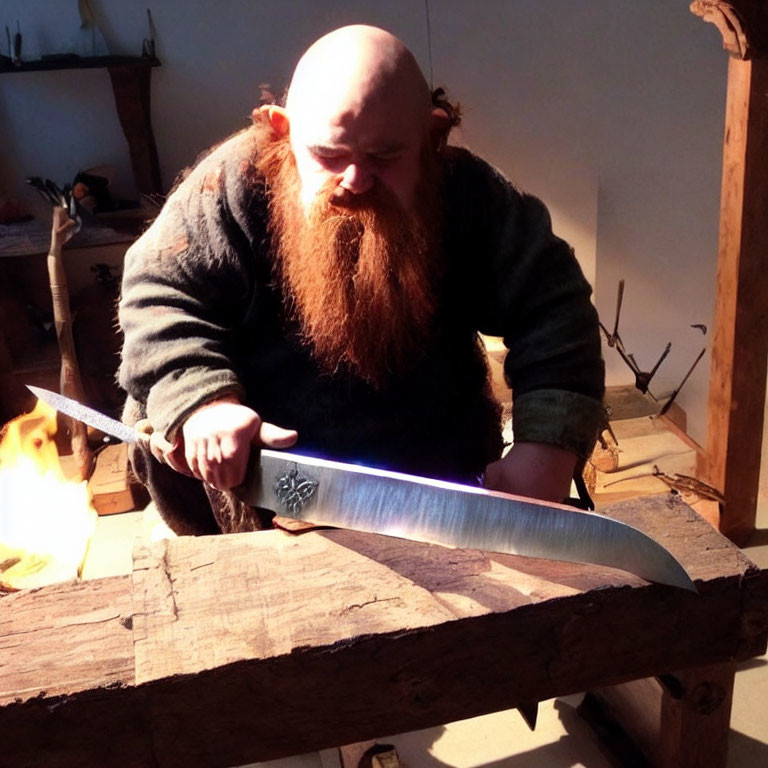 Craftsman forging glowing sword blade on an anvil