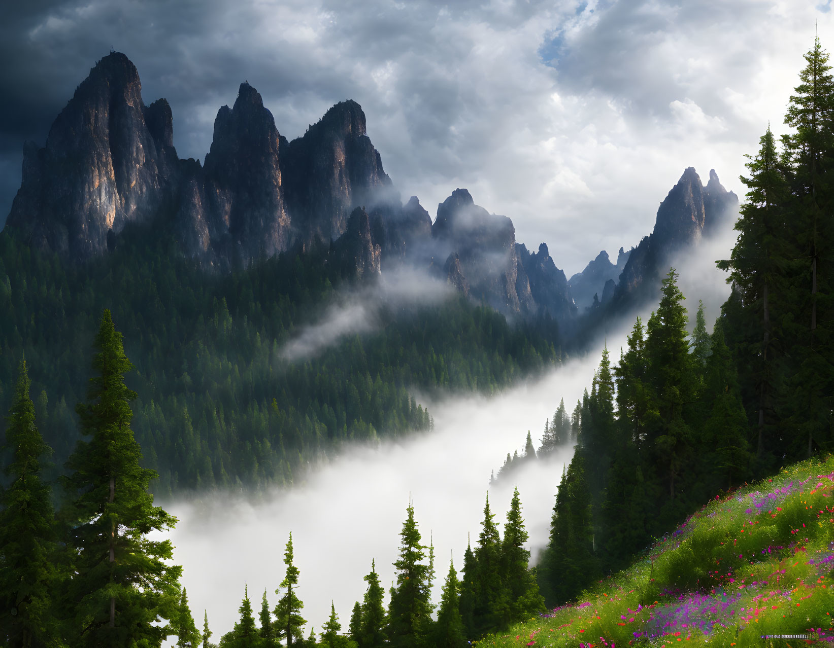 Majestic mountain landscape with mist, towering peaks, green trees, wildflowers, and dynamic cloudy