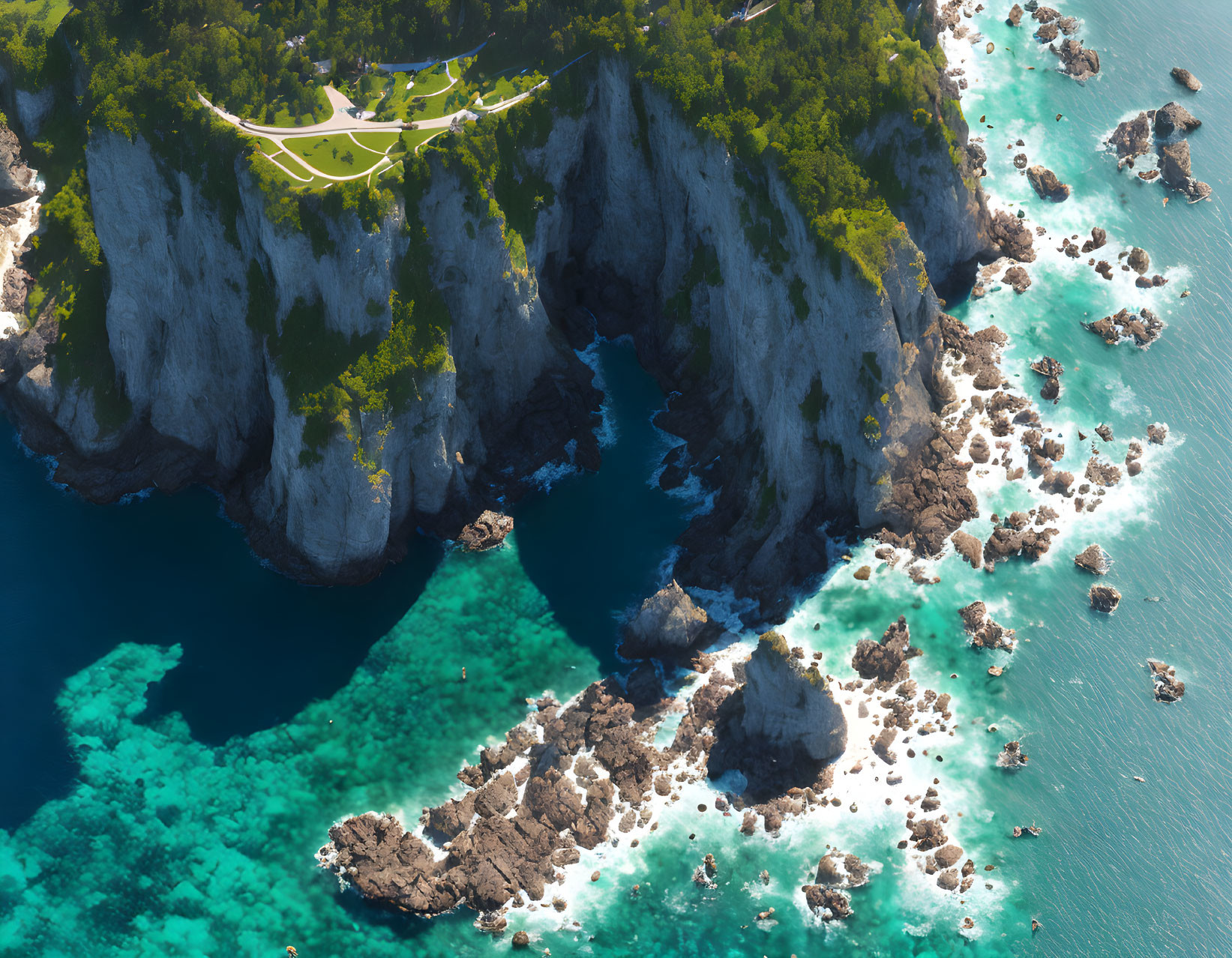 Scenic Aerial View of Rugged Coastline with High Cliffs