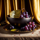 Purple Grapes with Golden Leaves on Black Plate Against Gold Curtain