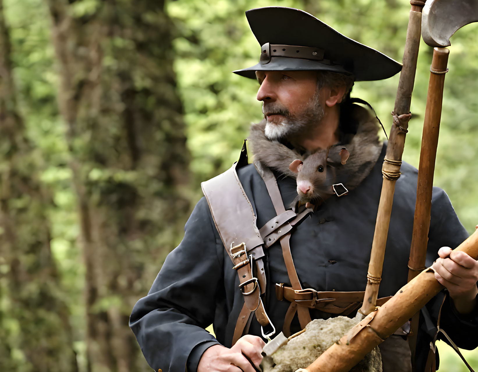 Man in historical clothing with musket and small animal in wooded area