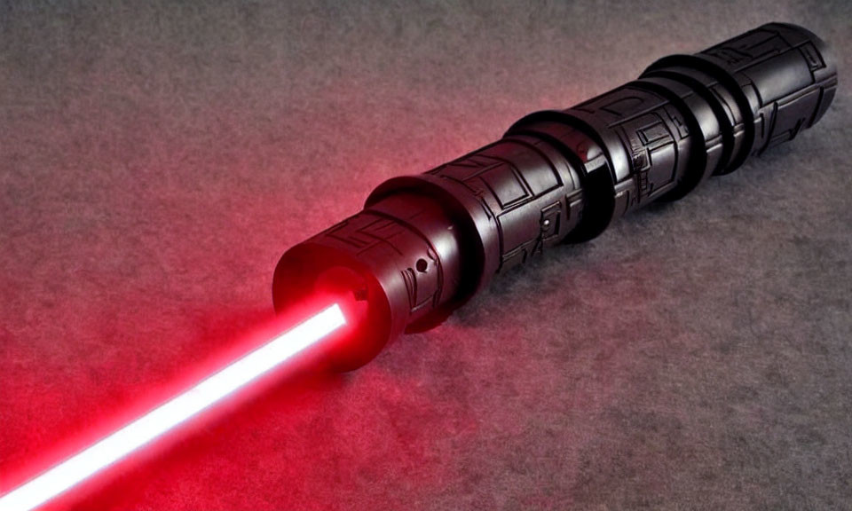 Intricately designed red lightsaber on dark background