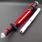 Intricately designed red and white lightsabers on reflective surface