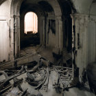 Abandoned interior with crumbling walls and scattered debris