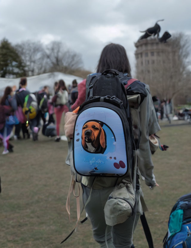 Person in Park with Dog-Printed Backpack