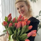 Blonde woman with tulip bouquet and stained glass window in digital illustration