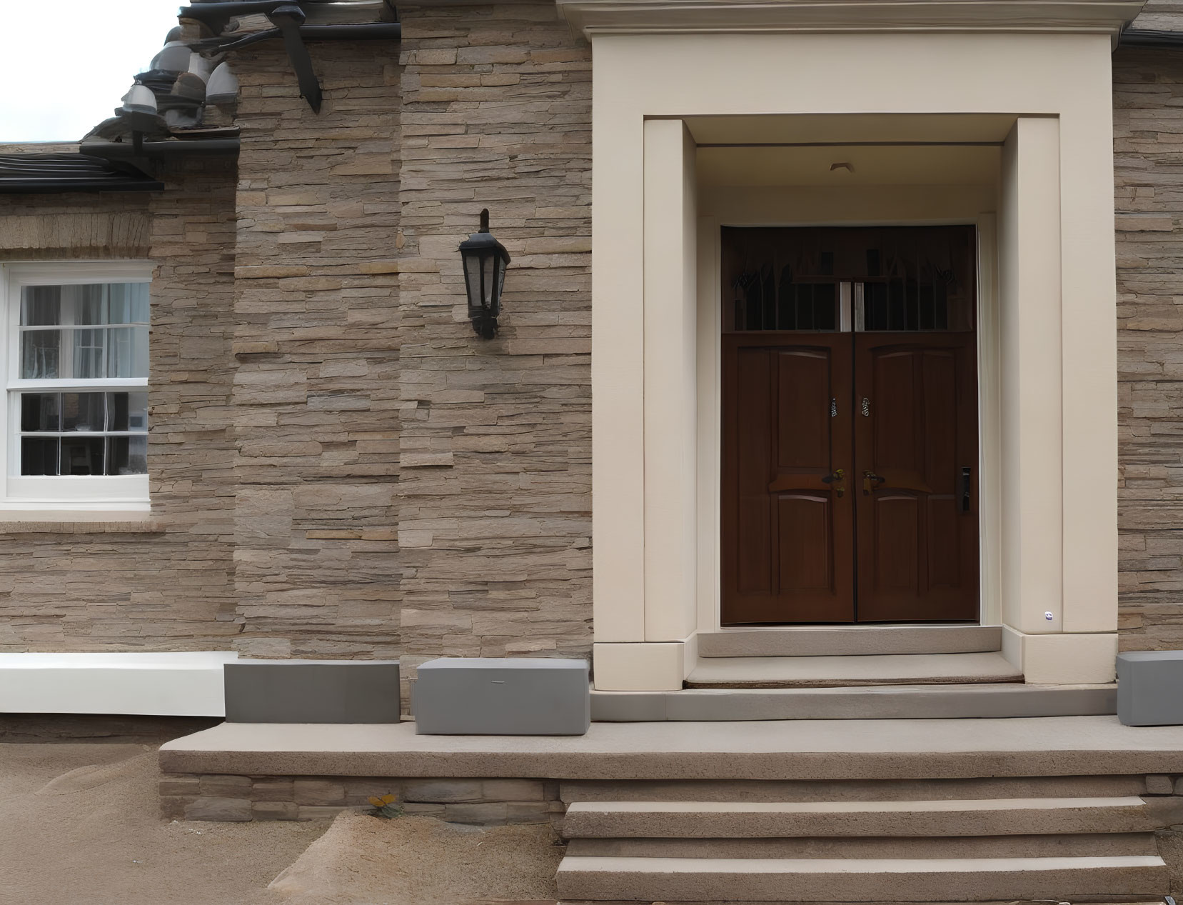 Residential Entrance with Brown Wooden Door and Glass Panels