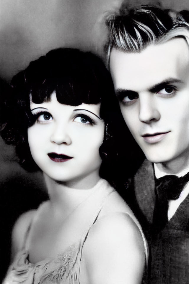 Classic Black and White Photo of Woman and Man with Short Curly and Slicked-Back Hair