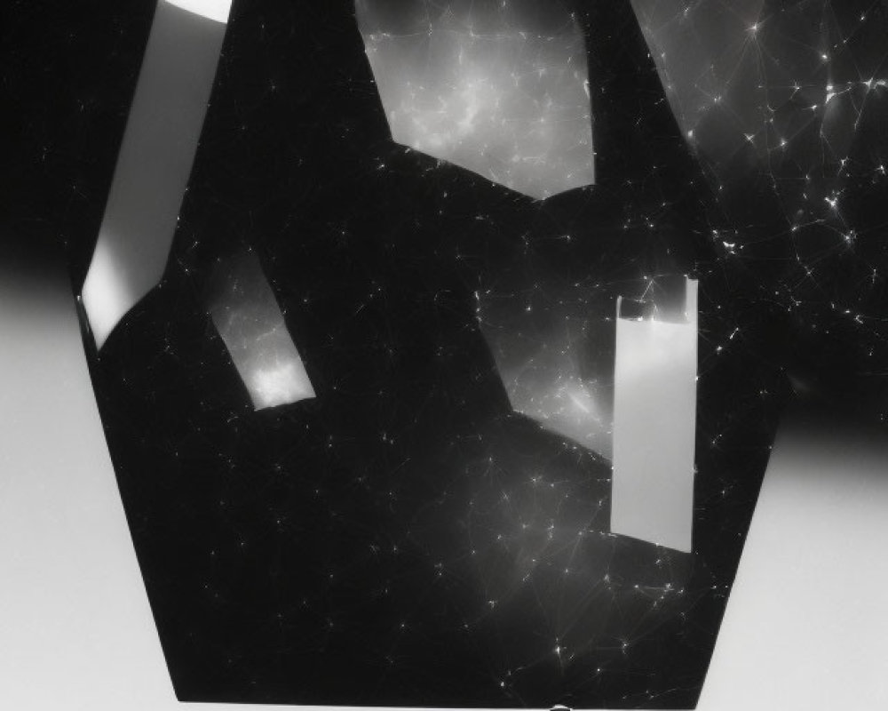 Monolithic, Faceted Structure with Astronauts on Celestial Surface