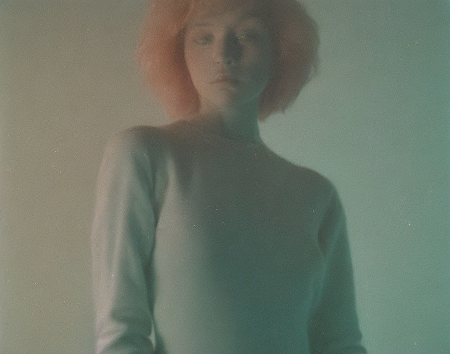 Orange-Haired Woman in Green Ambient Light with Vintage Aesthetic